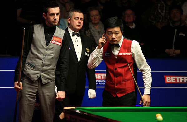 Mark Selby and Ding Junhui during the final of the Betfred Snooker World Championships at the Crucible Theatre. Photo: Nick Potts/PA