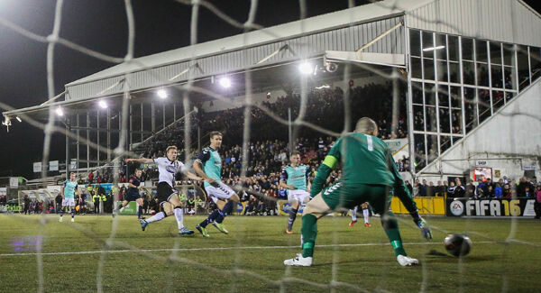 Dundalk's David McMillan scores their third goal of the game at Oriel Park. Pic: INPHO/Ryan Byrne
