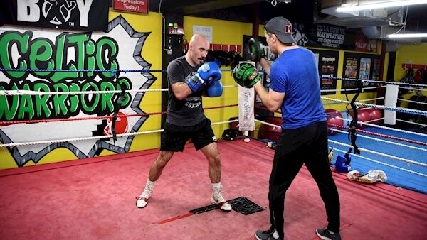 Gary "Spike" O'Sullivan, Irish professional boxer with his coach Packie Collins at the Celtic Warriors Boxing Club in Dublin. Photograph Moya Nolan.