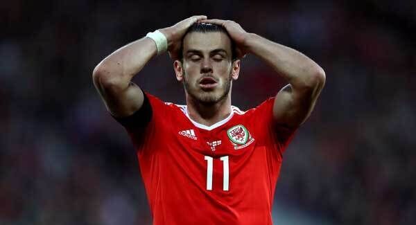 Wales' Gareth Bale reacts after coming close to scoring a second goal at the Cardiff City Stadium. Photo: Nick Potts/PA
