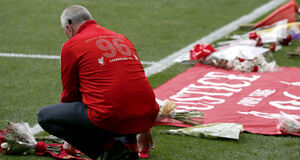 Flowers are laid at the side of the pitch before the last memorial service to be held at Anfield. Flowers are laid at the side of the pitch before the last memorial service to be held at Anfield.