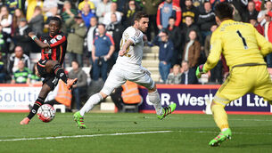 Bournemouth fans chant 'We're staying up' after team beats Swansea