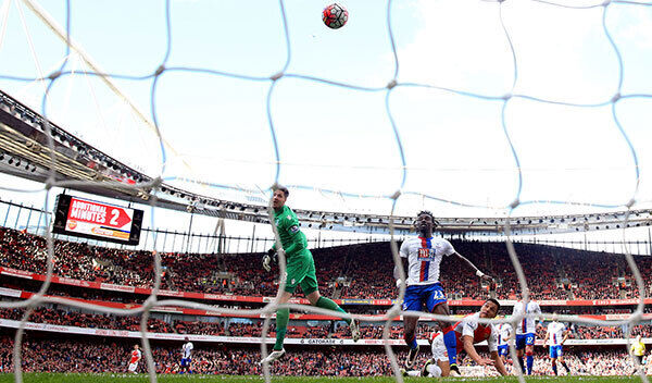 Arsenal's Alexis Sanchez (floor) scores his side's only goal of the game at the Emirates Stadium. Photo: Adam Davy/PA