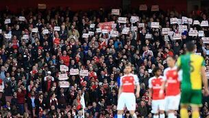 Fans protest proves damp squib as Arsenal secure win over Norwich