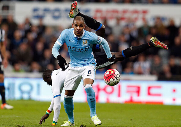 Newcastle United's Papiss Cisse is upended after an aerial challenge with Manchester City's Fernando. Photo: Owen Humphreys/PA
