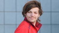 Fan outrage as 1D star Louis Tomlinson wins competition to design football shirt