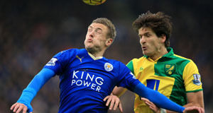 Leicester City's Jamie Vardy (left) and Norwich City's Timm Klose (right) battle for the ball in the air during the Barclays Premier League match at the King Power Stadium, Leicester. PRESS ASSOCIATION Photo.