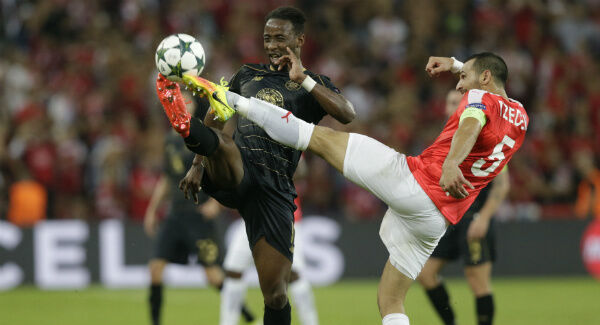 Celtic's Moussa Dembele and Hapoel Be’er Sheva's Shir Tzedek fight for the ball. AP Photo/Ariel Schalit
