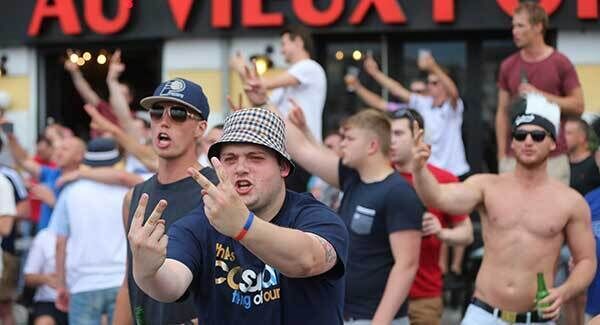 English football fans taunt French fans in the Olde Town area in Marseille ahead of the first game in Euro 2016. Photo: Niall Carson/PA