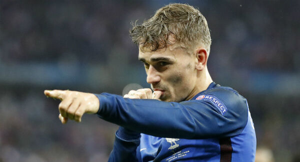 France's Antoine Griezmann celebrates after scoring his side's fourth goal. AP Photo/Frank Augstein.