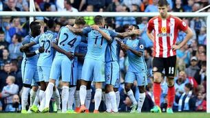 Own goal hands Man City opening day victory
