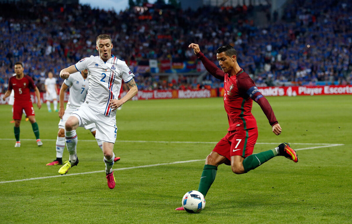 Portugal's Cristiano Ronaldo runs with the ball. AP Photo/Pavel Golovkin