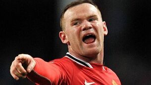 Wayne Rooney ends speculation he will close the door on England