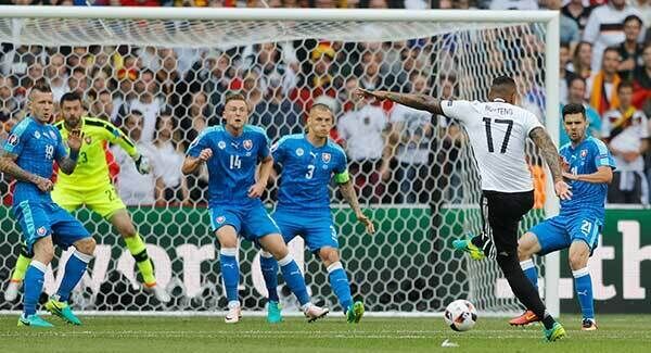 Germany's Jerome Boateng scores his side's first goal at the Pierre Mauroy stadium. (AP Photo/Frank Augstein