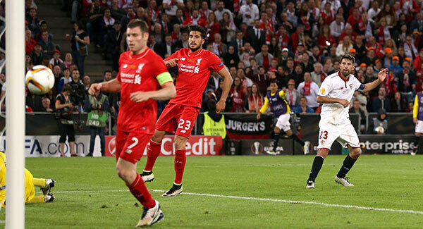 Sevilla's Andujar Coke scores his side's third goal. Photo: Adam Davy/PA