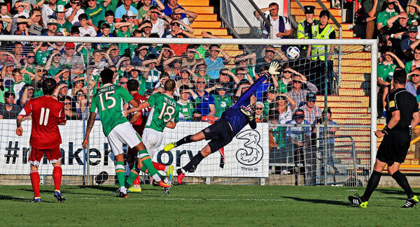 Mikhail Hardzeichuk of Belarus scores his side's first goal. Photo: INPHO/Donall Farmer