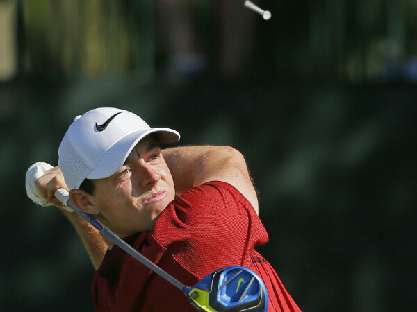 Rory McIlroy watches his tee shot on the first hole during a practice round for the PGA Championship golf tournament at Baltusrol Golf Club. AP Photo/Tony Gutierrez