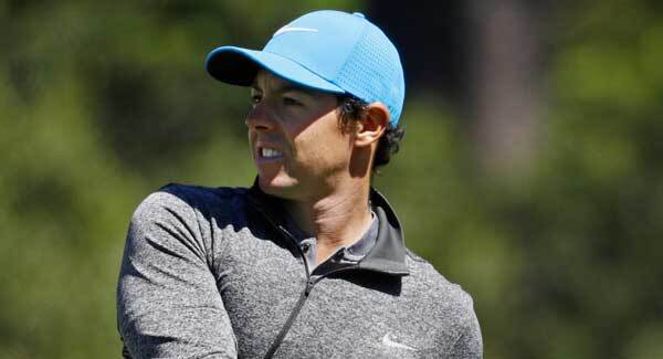 Rory McIlroy struggles as Lee Westwood soars in Dubai
