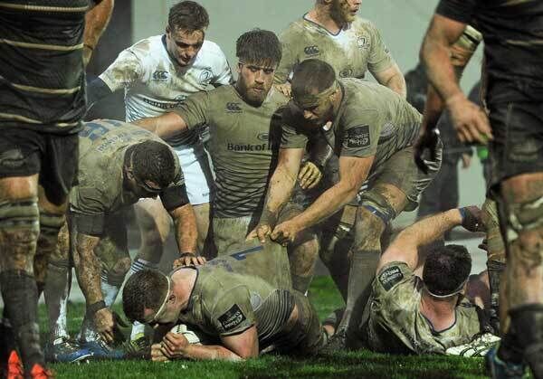 Leinster’s Dan Leavy is congratulated by teammates after scoring his team's fourth try of the match at the Stadio Sergio Lanfranchi. Photo: Seb Daly / SPORTSFILE