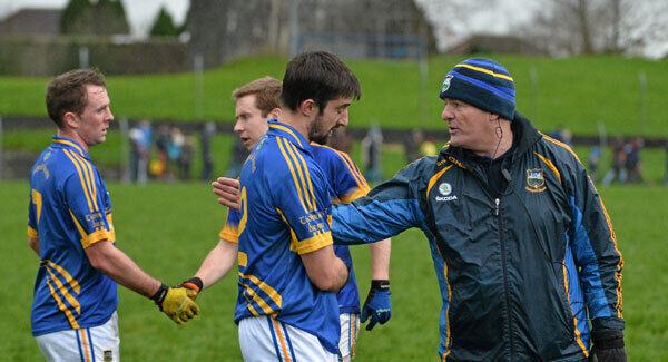 Liam Kearns pictured with his players in January.