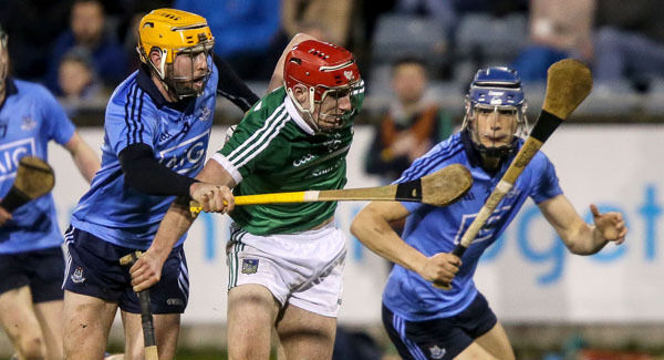 Eoghan O'Donnell and Oisin Gough with Barry Nash of Limerick. Picture: INPHO
