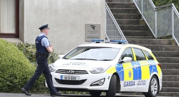 A Garda outside Waterford Courthouse today. Pic: PA