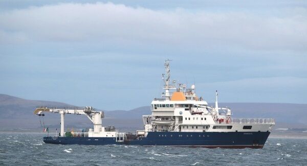 The Granuaile arrives back into Blacksod, Co. Mayo, Ireland, with wreckage from Coastguard helicopter Rescue 116 onboard. Photo: Brian Lawless/PA Wire