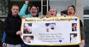 Family and friends of the late Daniel McAnaspie celebrate outside the Central Criminal Court in Dublin today after Richard Dekker was found guilty of his murder in 2010. Pic Collins Courts.