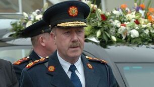 Wallace tells Dail former Commissioner attended Garda HQ several times last week