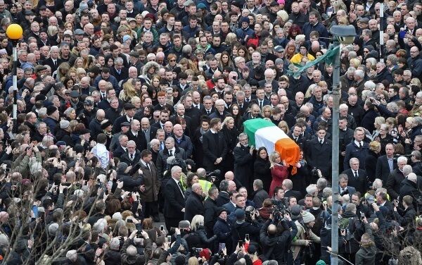 Thousands of mourners follow Martin McGuinness’ coffin through the Bogside in Derry today. Picture by Justin Kernoghan Thousands of mourners follow Martin McGuinness’ coffin through the Bogside in Derry today. Picture by Justin Kernoghan