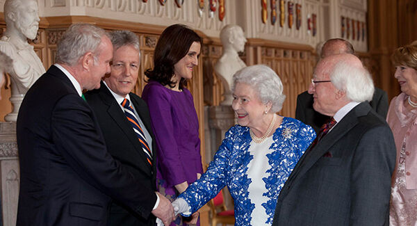 Martin McGuinness shaking hands with the British monarch in 2014.