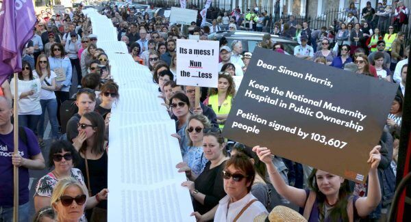 Protestors holding up a petition in Dublin on May 5. Pic: Derek Speirs