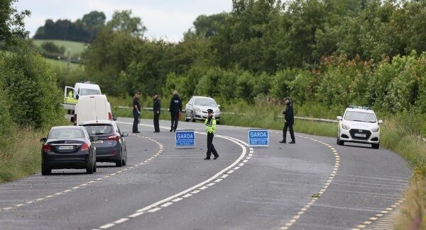 The scene of the crash where the road has been closed. The scene of the crash where the road has been closed.