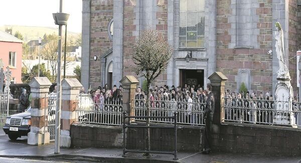 Mourners attending the funeral of 18-year-old Alex Ryan at Millstreet, Co Cork