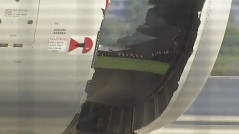Plane lands safely in Sydney with hole in engine casing Plane lands safely in Sydney with hole in engine casing