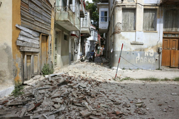 The debris of a damaged building after an earthquake in the village of Plomari on the northeastern Greek island of Lesbos. Manolis Lagoutaris/InTime News via AP The debris of a damaged building after an earthquake in the village of Plomari on the northeastern Greek island of Lesbos. Manolis Lagoutaris/InTime News via AP