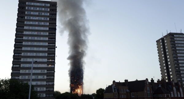 Smoke and flames rise from the building on fire in London. Pic: PA Smoke and flames rise from the building on fire in London. Pic: PA