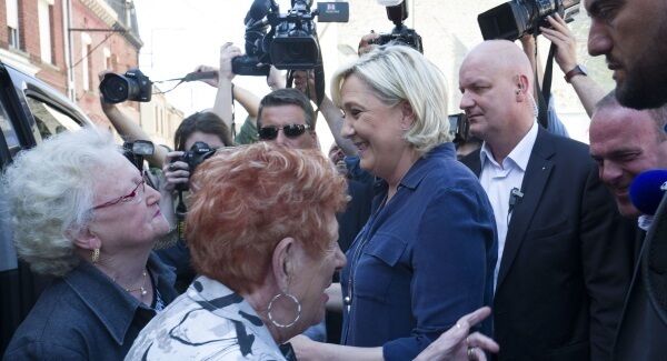 French far-right presidential candidate, Marine Le Pen, leaves a polling station after casting her vote