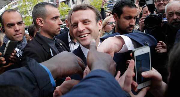 French government resigns in symbolic gesture after Macron victory