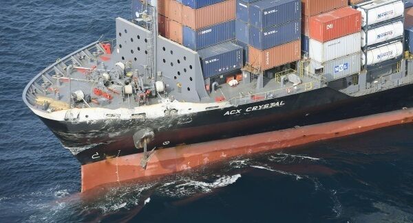 The damage of Philippine-registered container ship ACX Crystal is seen off Izu Oshima, Japan, after it had collided with the USS Fitzgerald southwest of Yokusuka, Japan. Pic: AP
