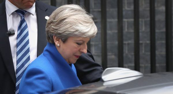 Prime Minister Theresa May leaves Downing Street to travel to Buckingham Palace for an audience with Queen Elizabeth II. Photo: Jonathan Brady/PA Wire