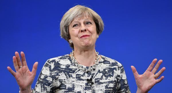 Theresa May was awaiting the real results after an exit poll suggested she was in for a bruising night