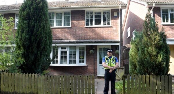A police community support officer stands in front of a house in Cardiff as searches are carried out in connection with the attack near to the Finsbury Park Mosque in north London.
