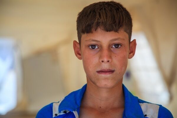 Alahddin, 13, at Hamam Al Ali Camp in Ninewa Province, in Iraq. Picture: Ahmad Baroudi/Save the Children/PA Wire