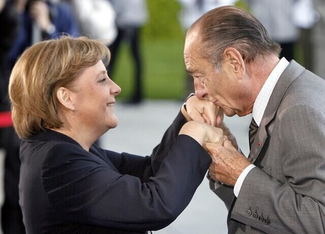 Angela Merkel with Jacques Chirac in Berlin in 2007 (Michael Sohn/AP)