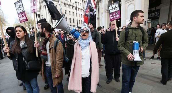 UAF (Unite Against Fascism)demonstrators near Trafalgar Square in London, during a counterprotest against Britain First and EDL (English Defence League) marches. UAF (Unite Against Fascism)demonstrators near Trafalgar Square in London, during a counterprotest against Britain First and EDL (English Defence League) marches.