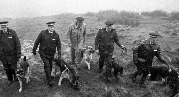 File photo from 1986 of police using specially trained sniffer dogs on Saddleworth Moor to search for Keith Bennett. Pic: PA File photo from 1986 of police using specially trained sniffer dogs on Saddleworth Moor to search for Keith Bennett. Pic: PA