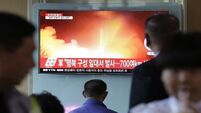 North Korea test fires 'new longer range missile'