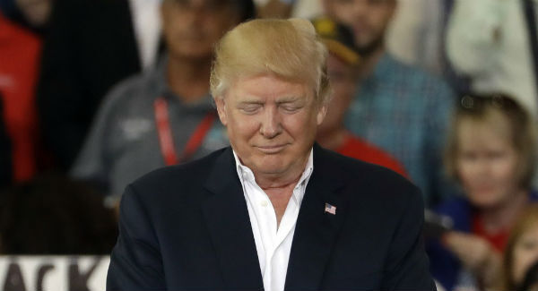 Intelligence report disputes threat posed by travel ban nations