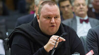 Internet boss Kim Dotcom can be extradited to the US, New Zealand judge rules